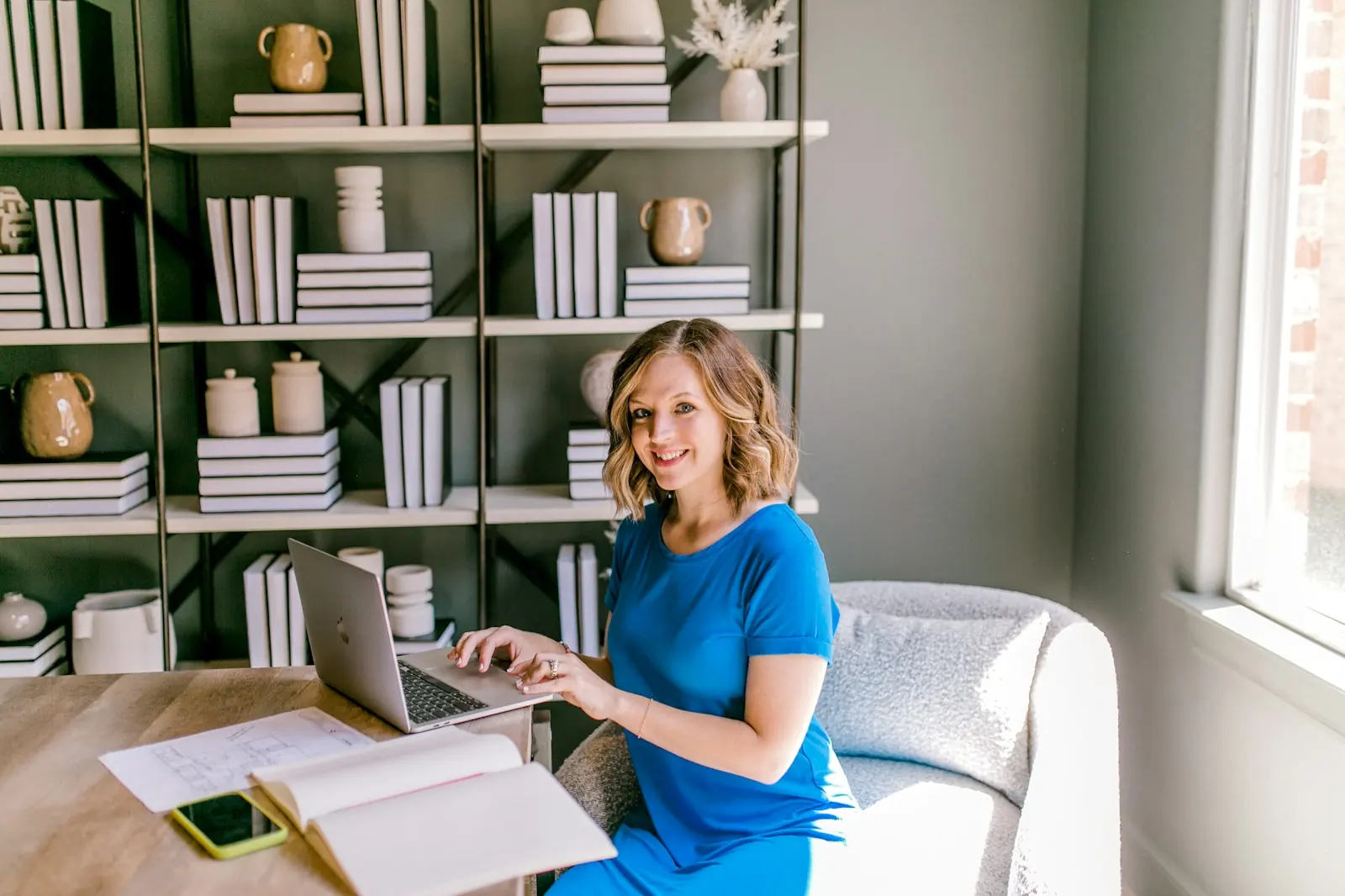 Entrepreneur working on her bookkeeping on a laptop